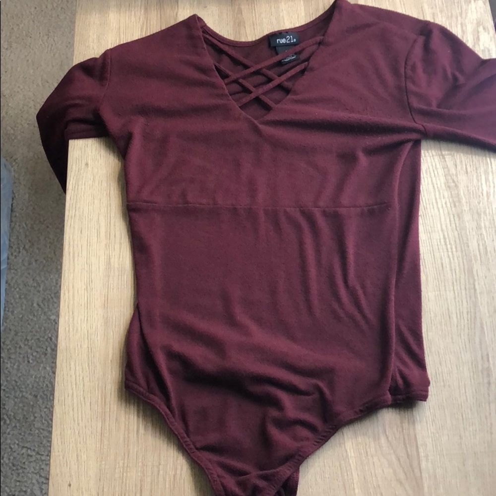 Maroon tight fitting body suit